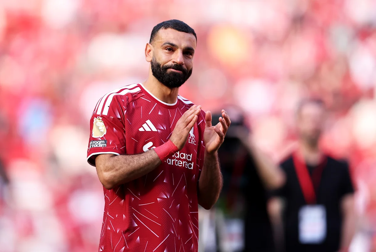 Mohamed Salah merayakan gol dalam pertandingan Liga Inggris bersama Liverpool di Stadion Anfield.